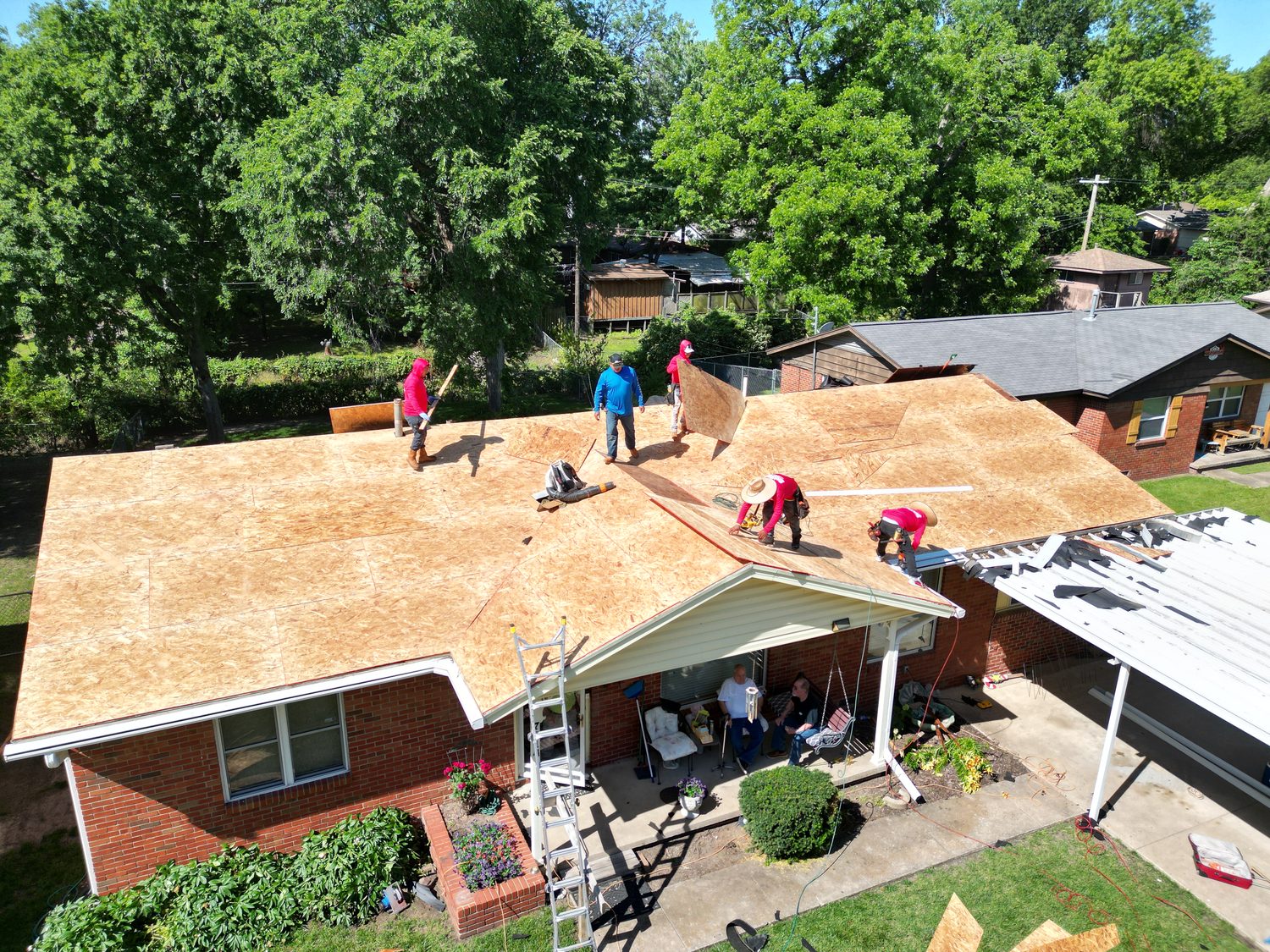 Volunteer crew working on a donated roof