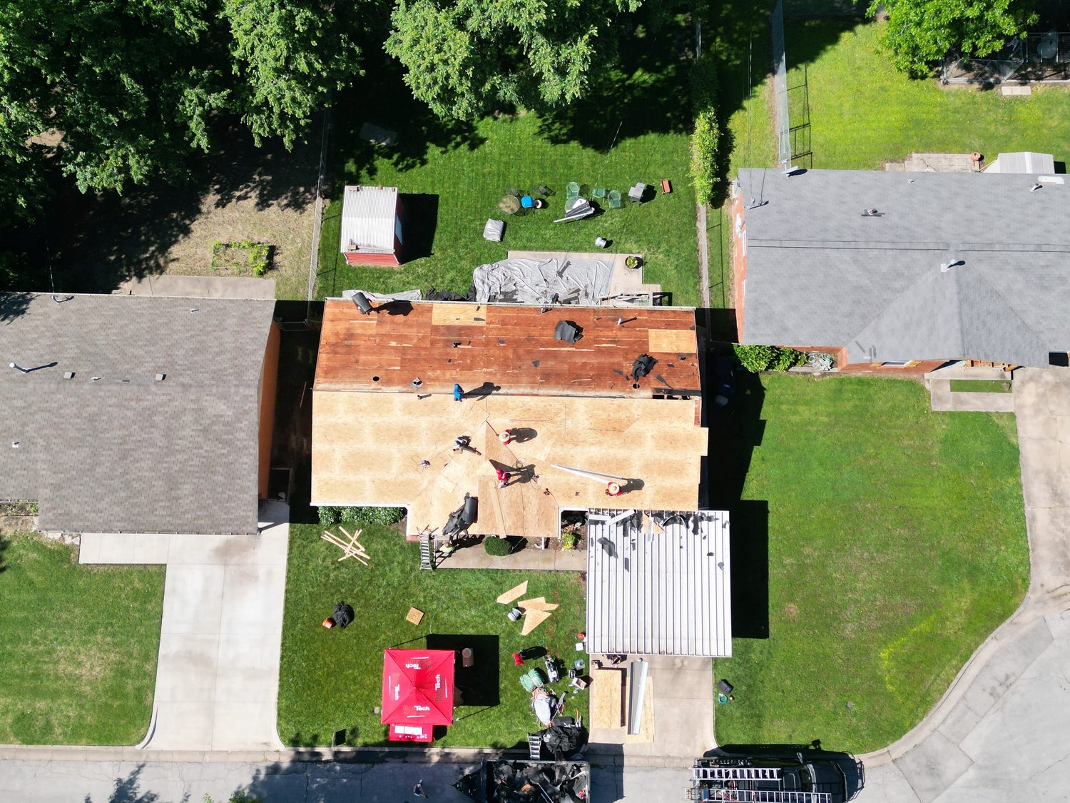Aerial view of a tear-off on a Roofing for a Reason home
