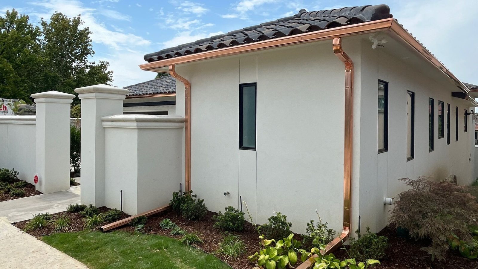 Custom copper gutters and downspouts