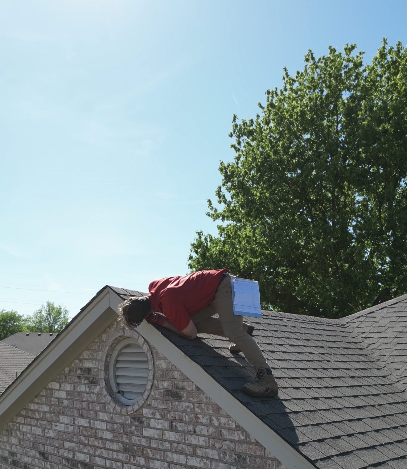 Inspecting the ridge and vents