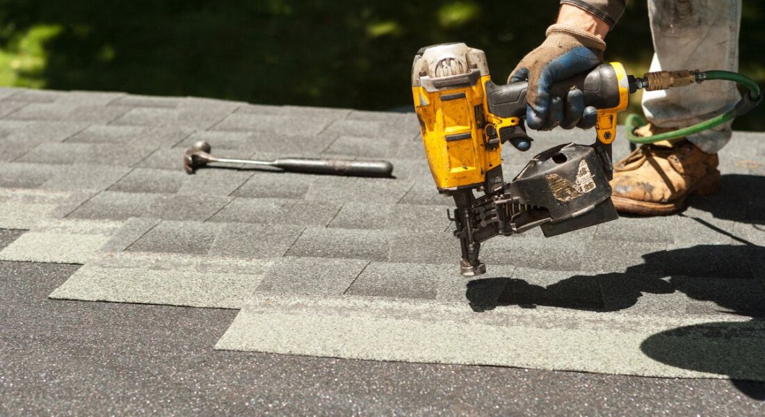 Roofer Installing Shingles