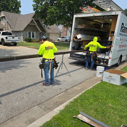 Seamless Gutter Lead Ricardo Ronquillo forming seamless gutters in a RainTech fleet truck.